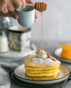 Souffle-Style Pancake stack with Fresh Ricotta and Almonds