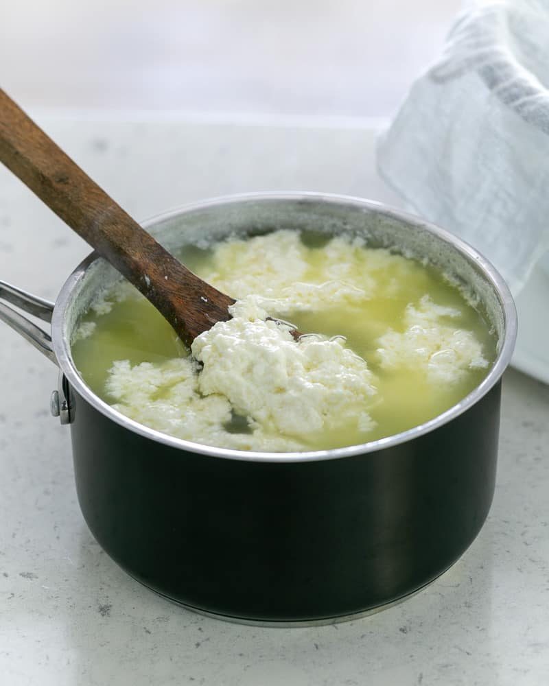 Wait for the milk to curdle and separate from the whey to make paneer