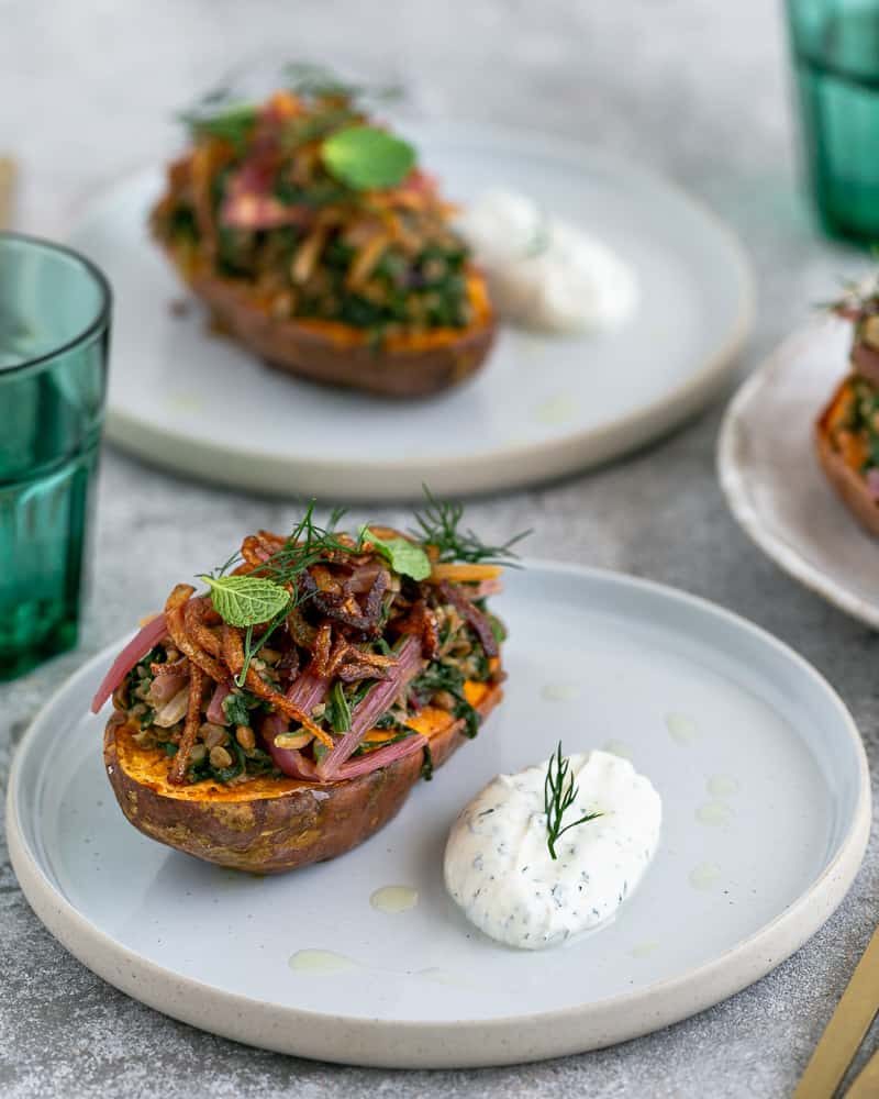 Baked sweet Potato with Lentils and Swiss Chard served in a plate like in a restaurant