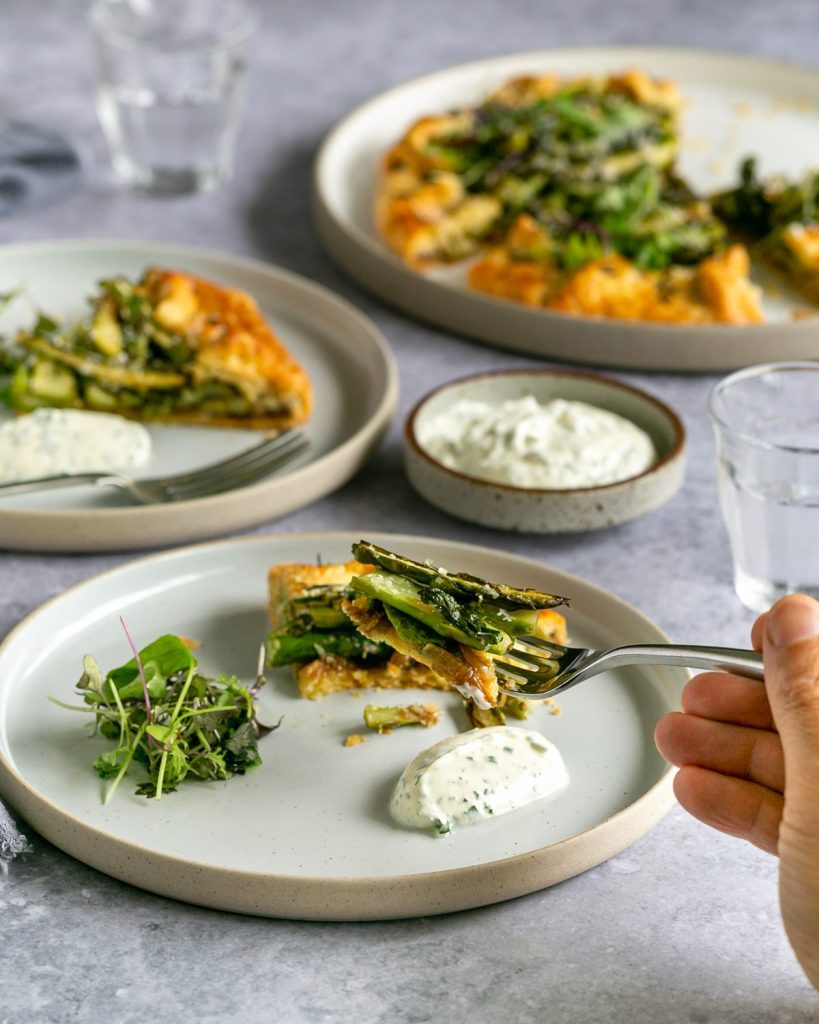 Piece of Asparagus and Parmesan Crostata on a fork