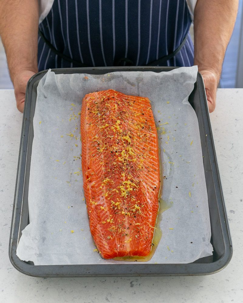 Seasoned trout fillet with spices and grated lemon zest