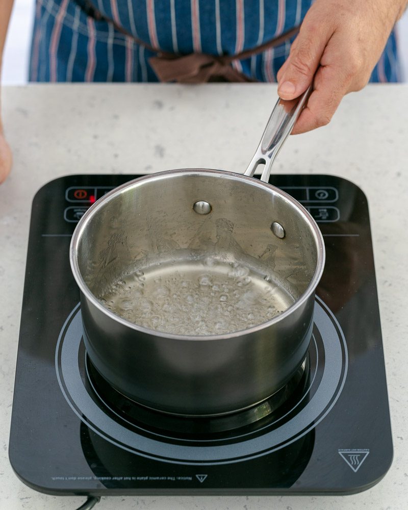 boiling sugar and water to make caramel