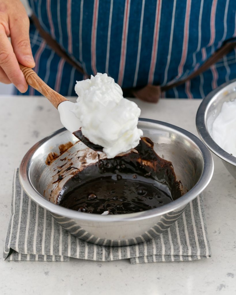 Beaten egg whites folded into melted dark chocolate
