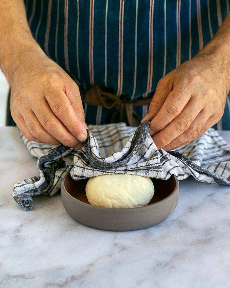 Cover the puri dough with moist cloth