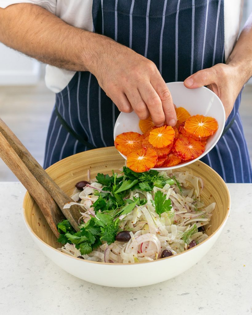 Blood orange rounds added to the salad