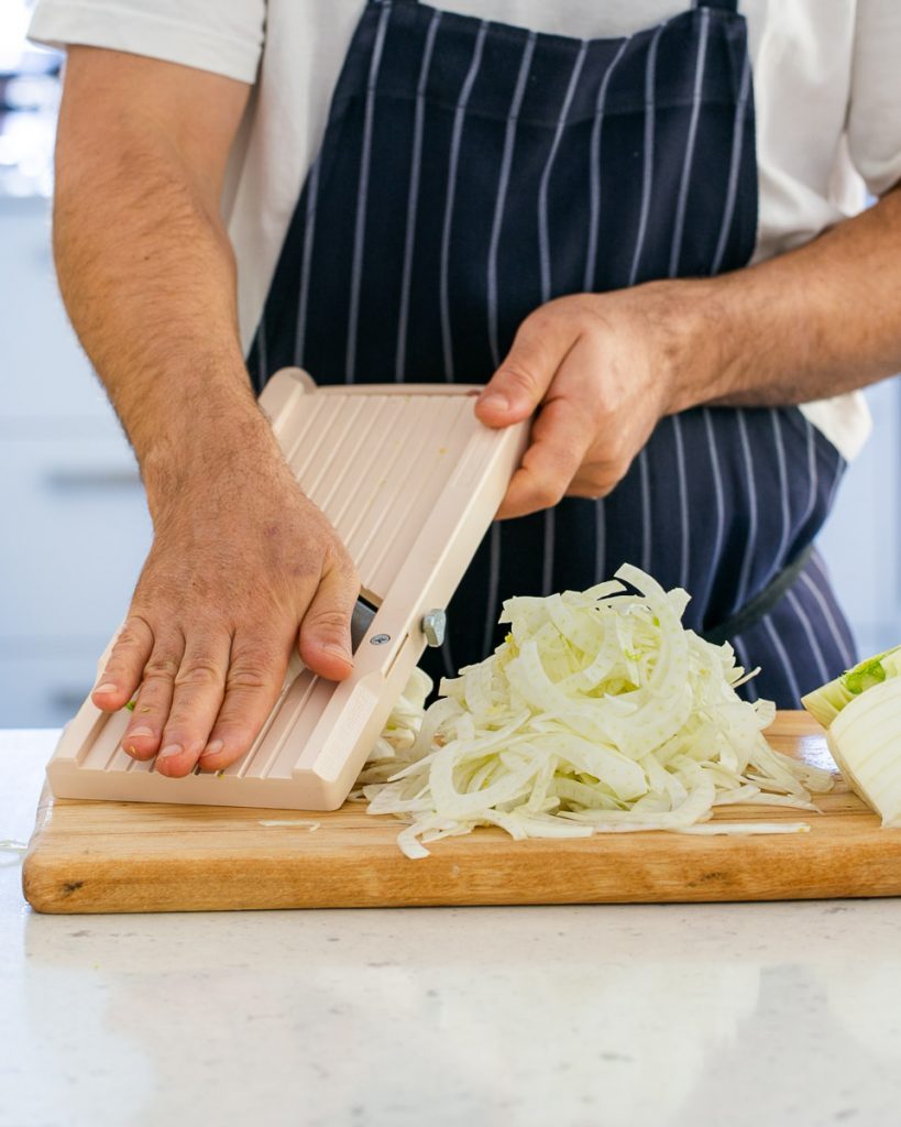 Slicing Fennel on a Japanese mandoline for the salad