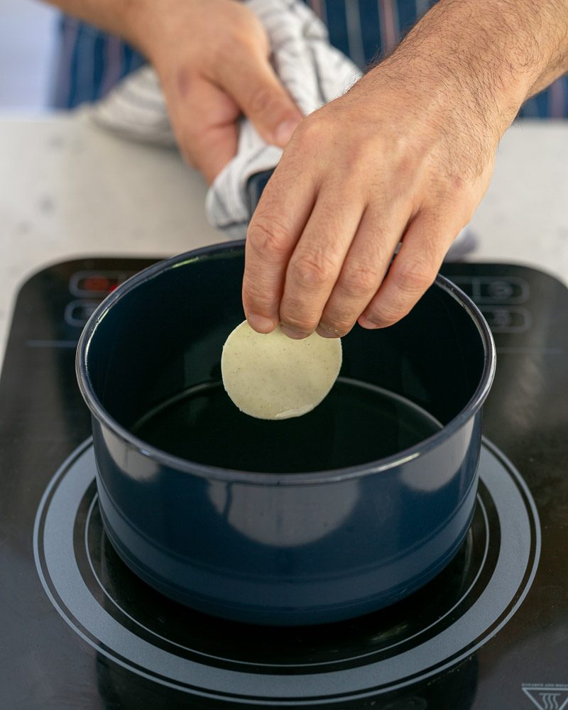 Frying puri dough rounds in hot oil