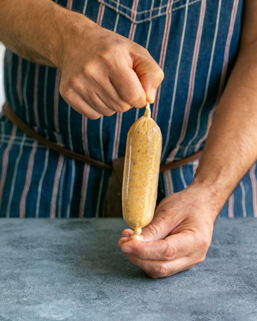 Rolled miso butter in cling wrap to refrigerate