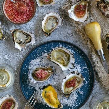 Oysters three ways served in a plate