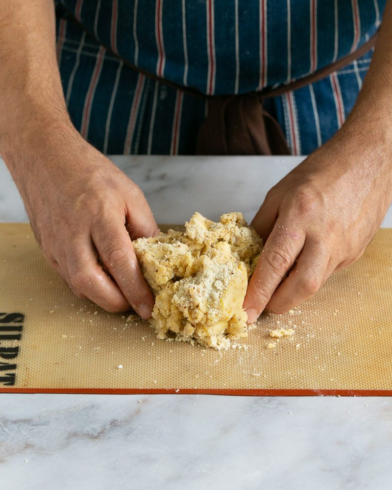 bringing dough mix together with fingers