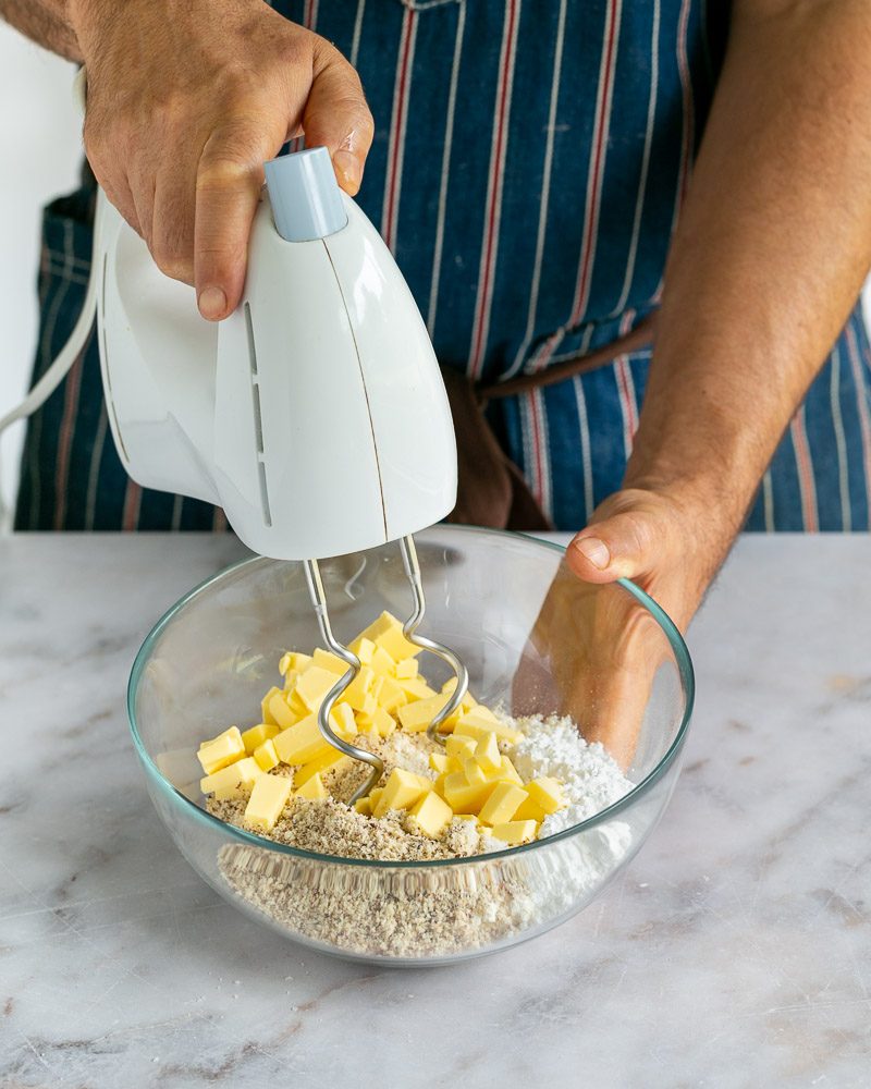 Mixing ingredients to make tart shell