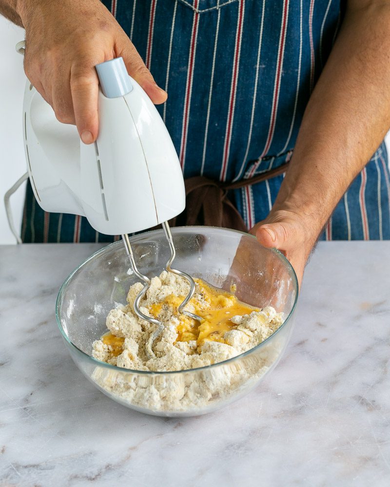 Beaten egg added to dough mix