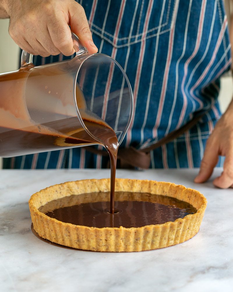 Filling tart shell with chocolate ganache