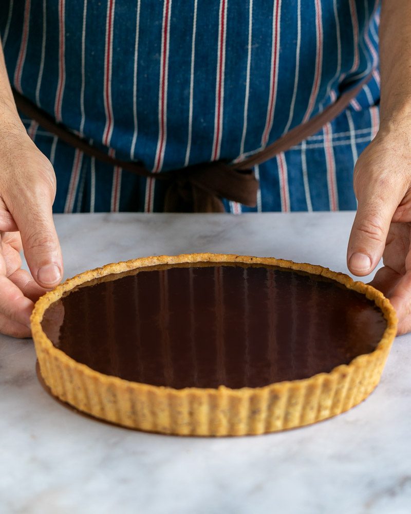 Tart shell filled with chocolate ganache