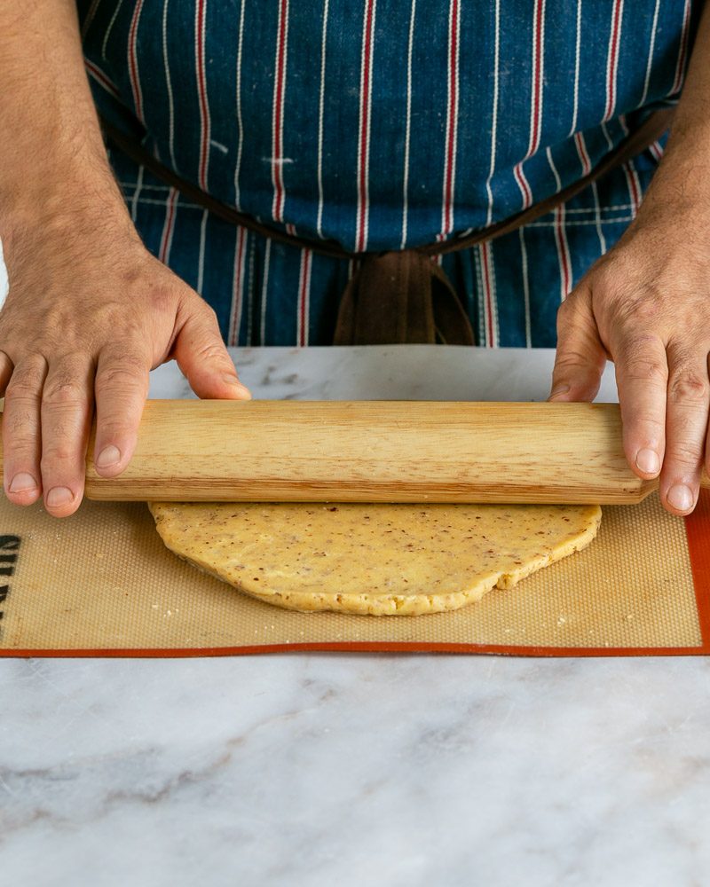 Rolling dough to make tart shell