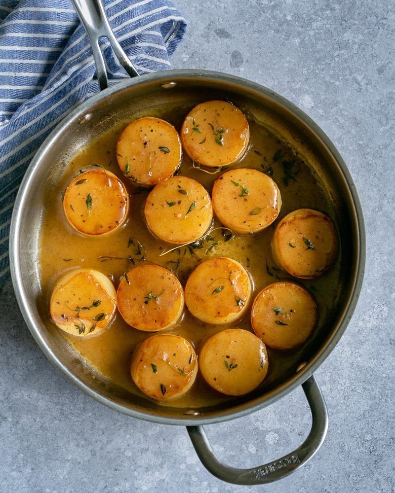 Glazed Fondant potatoes in a pan