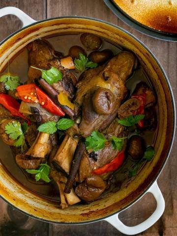 Braised lamb shanks in a pot