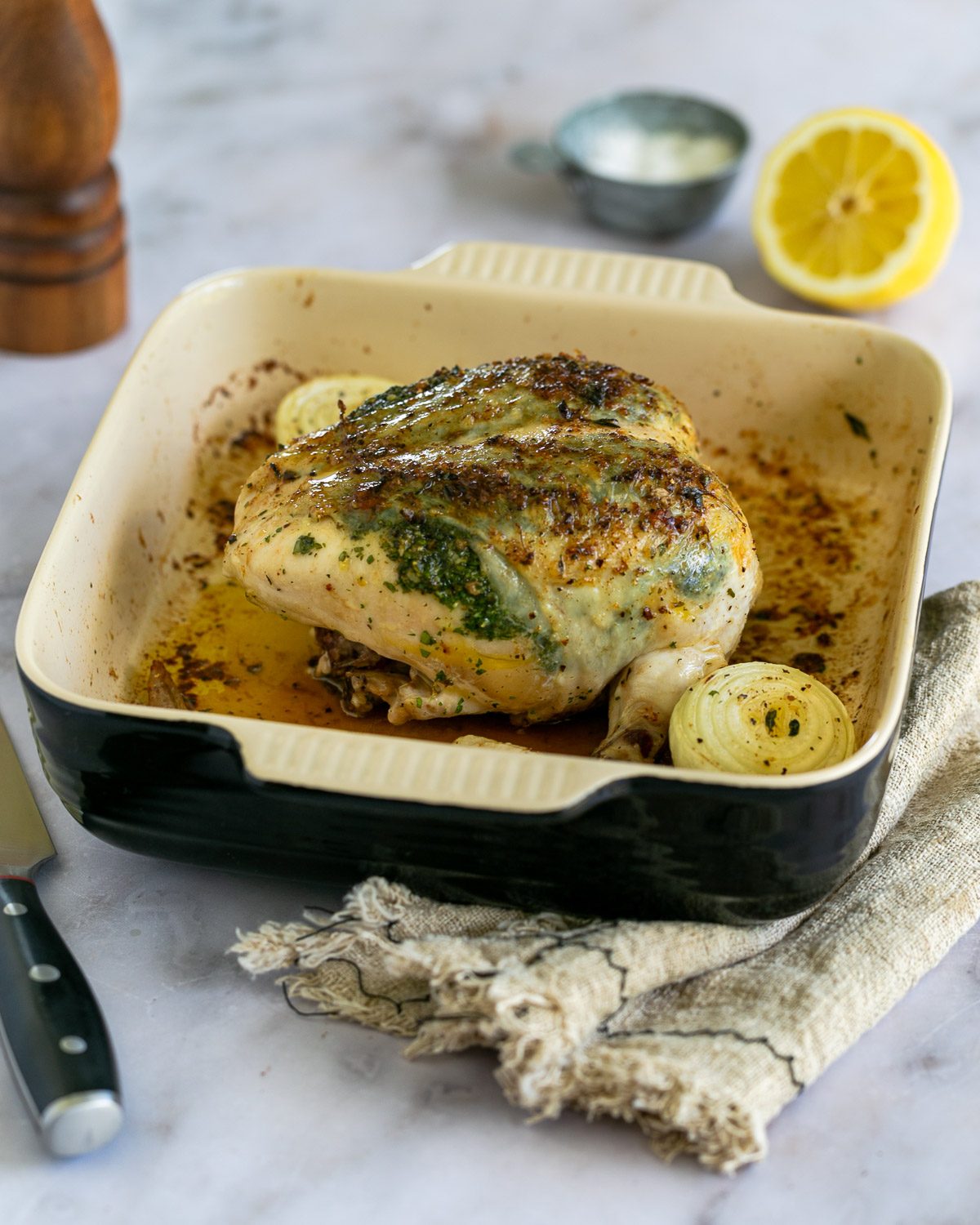 Baked chicken breasts on bone out of the oven