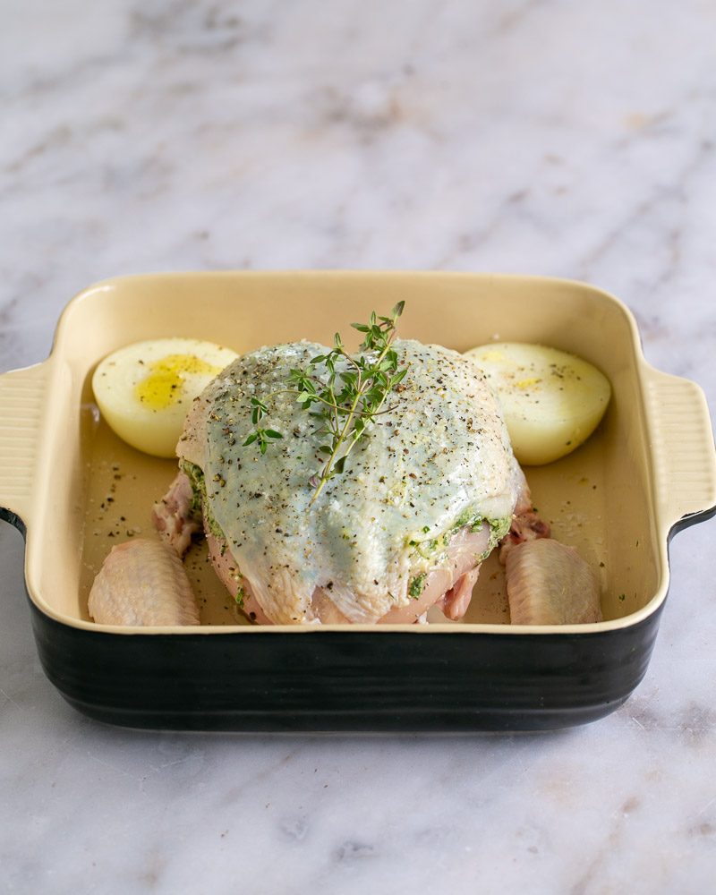 Chicken breasts on bone ready to be baked in the oven