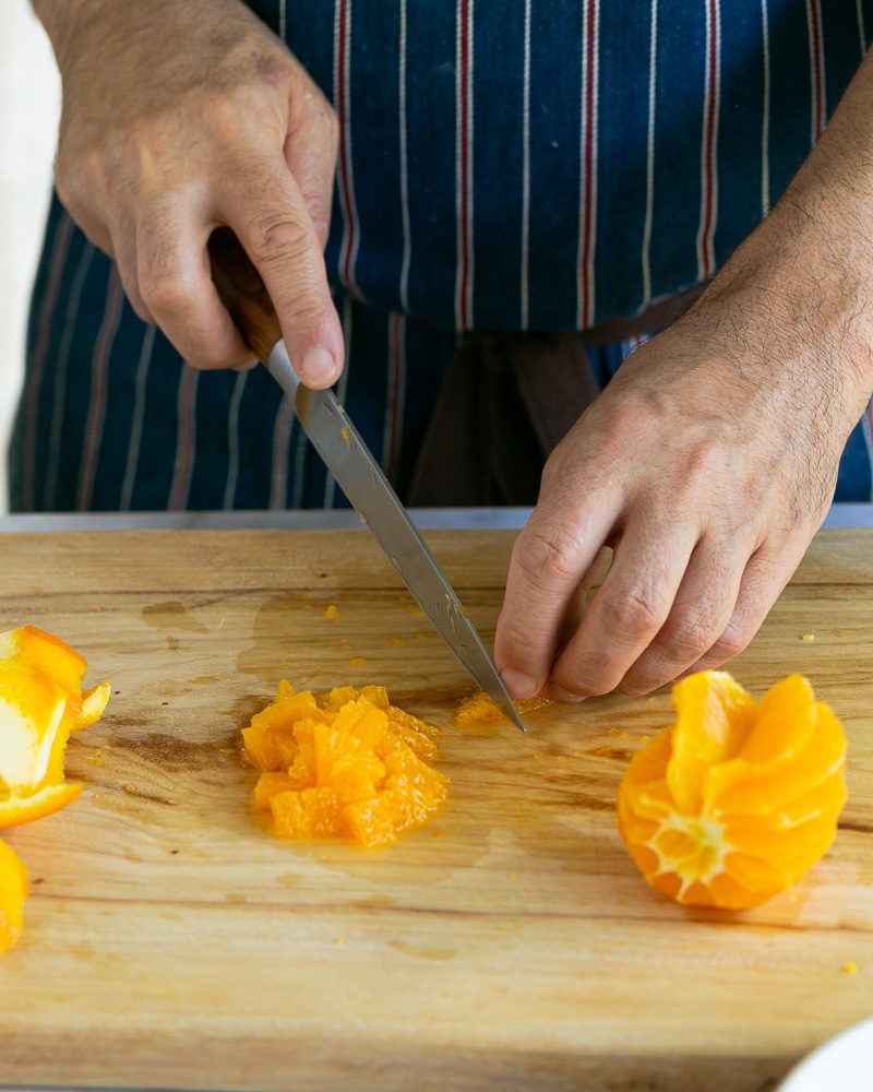 Cutting oranges to add to the gremolata