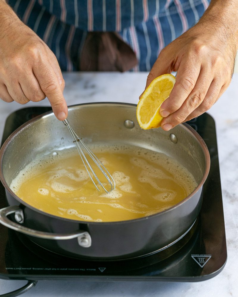 Squeeze of lemon into reduced chicken stock for gravy 