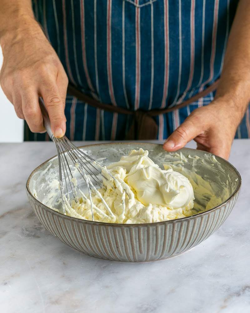 Whipped cream sugar added to the cream cheese mix