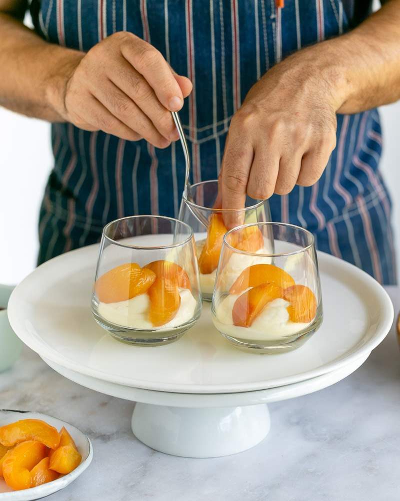 Poached peach slices on cheesecake mousse