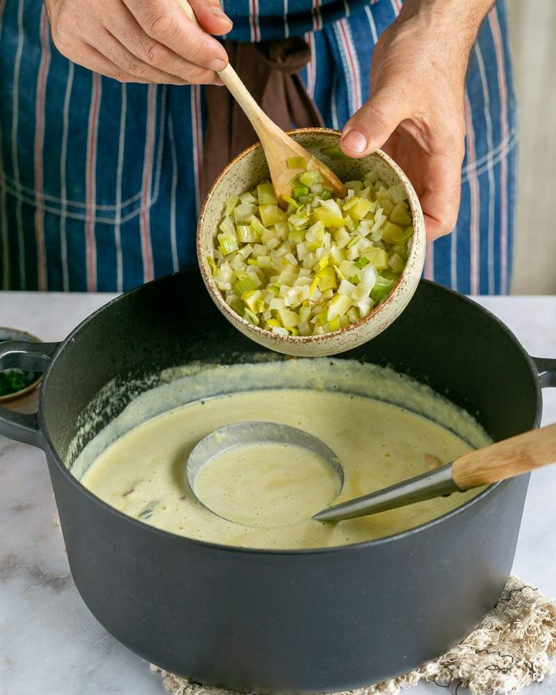 Adding cooked vegetables to the soup