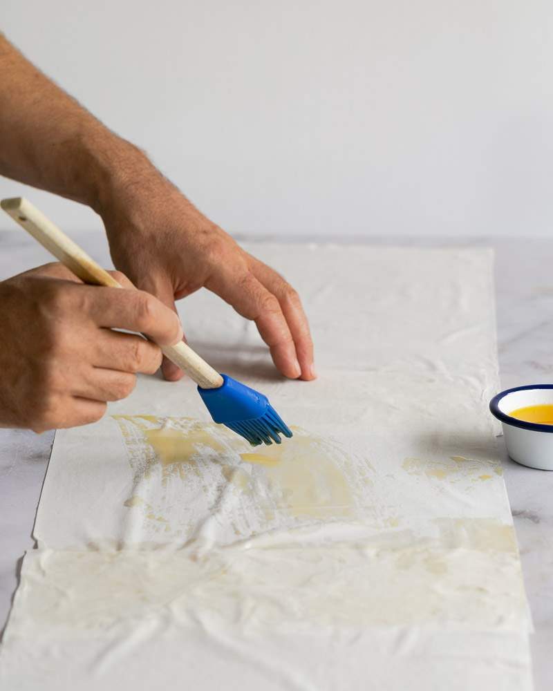 Preparing filo sheets for braised red cabbage filling