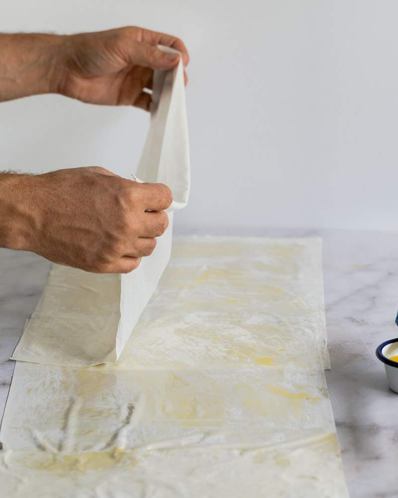 Preparing filo sheets for braised red cabbage filling