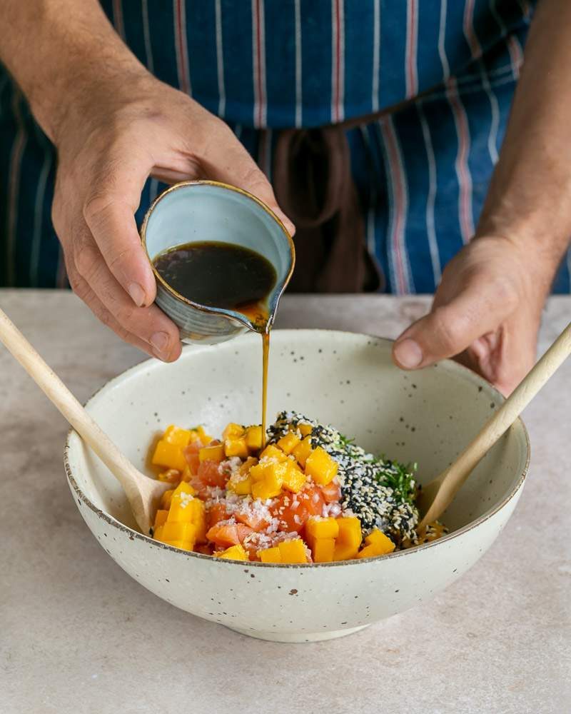 Adding mirin dressing to the tartare