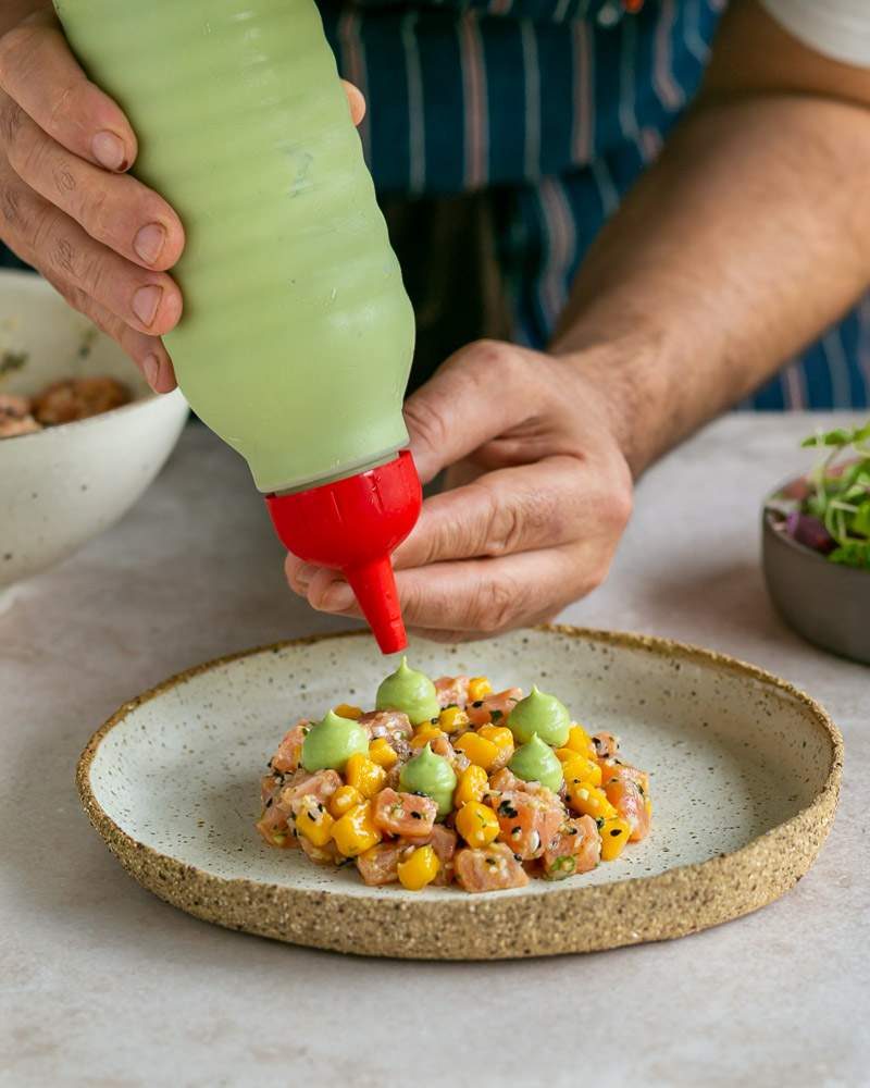 Avocado and Wasabi sauce drops to dress salmon tartare