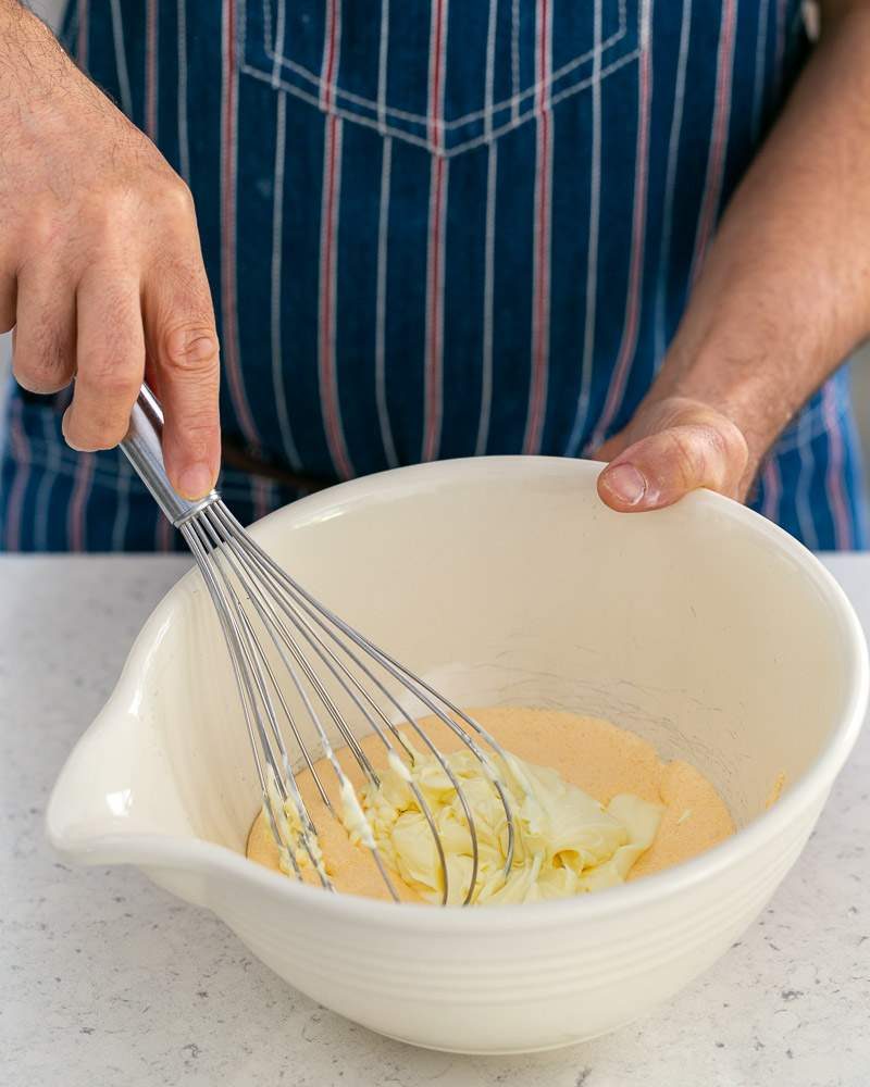 Mixing mascarpone with a whisk