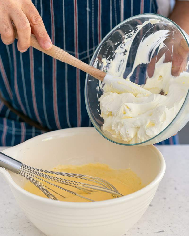 Whipped cream added to Tiramisu mix