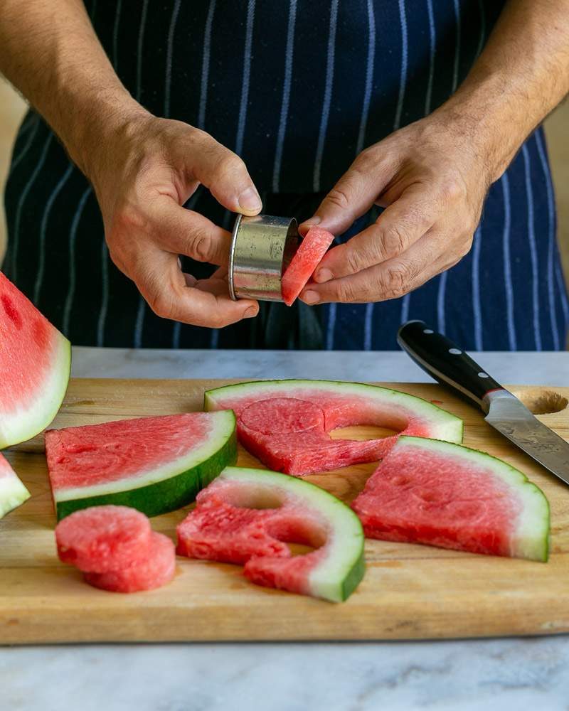 Cutting watermelon for salad