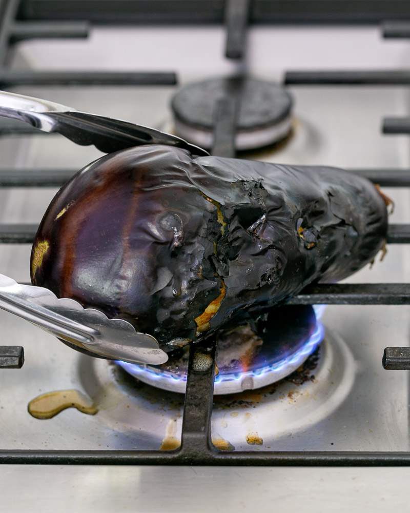 Burning the eggplant for smoky flavour