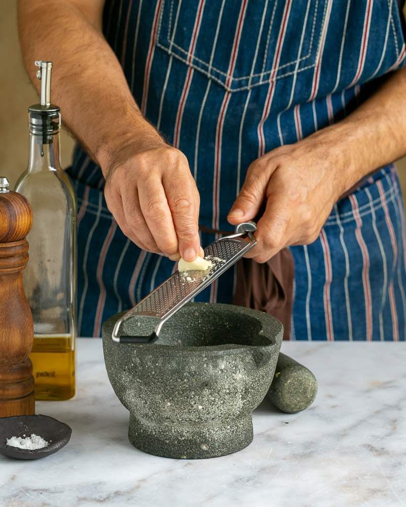 Grating garlic for the pesto