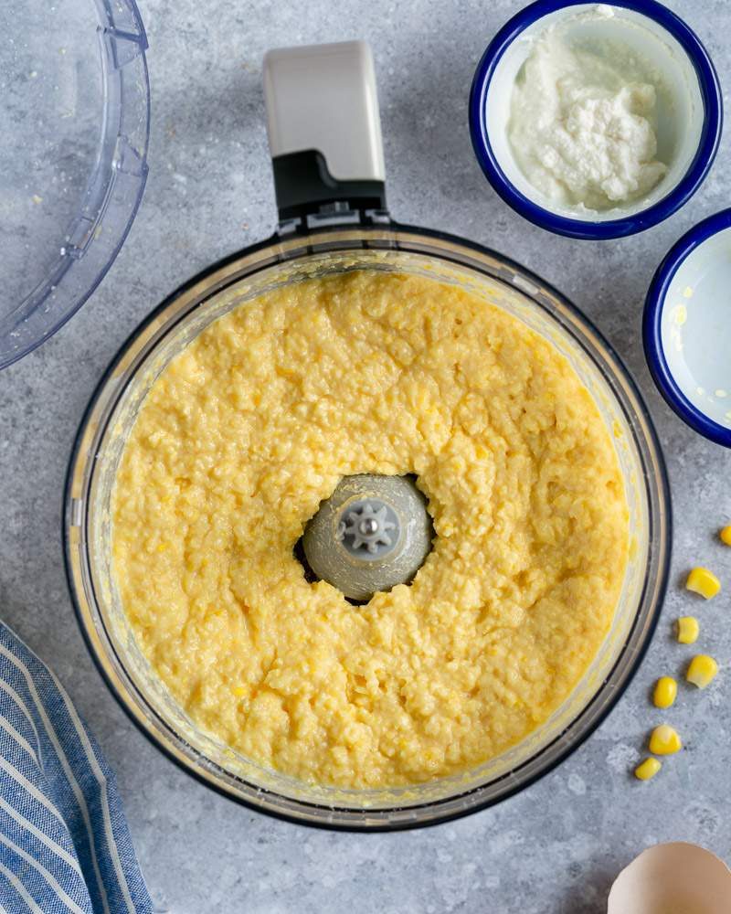 Cornbread ingredients in a food processor