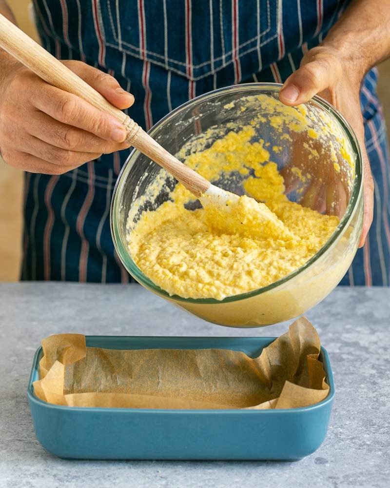 Cornbread mix transferred to baking dish 