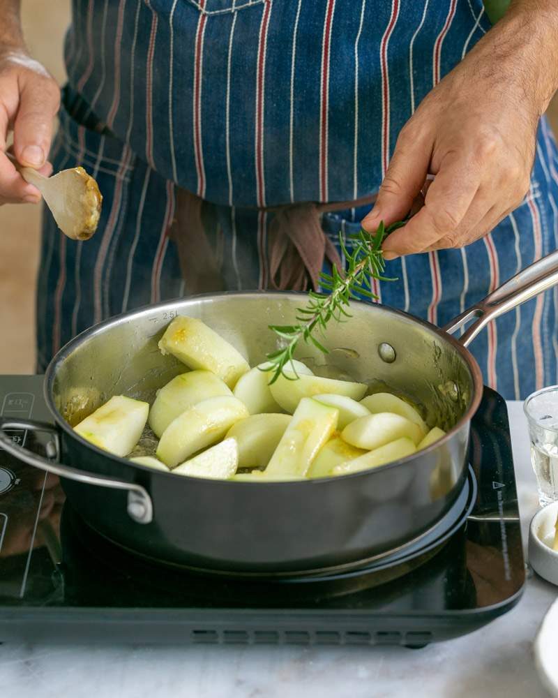 Adding rosemary for flavour while stewing apples