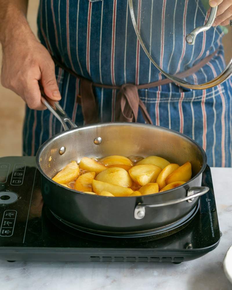 Apples stewing in caramel sauce