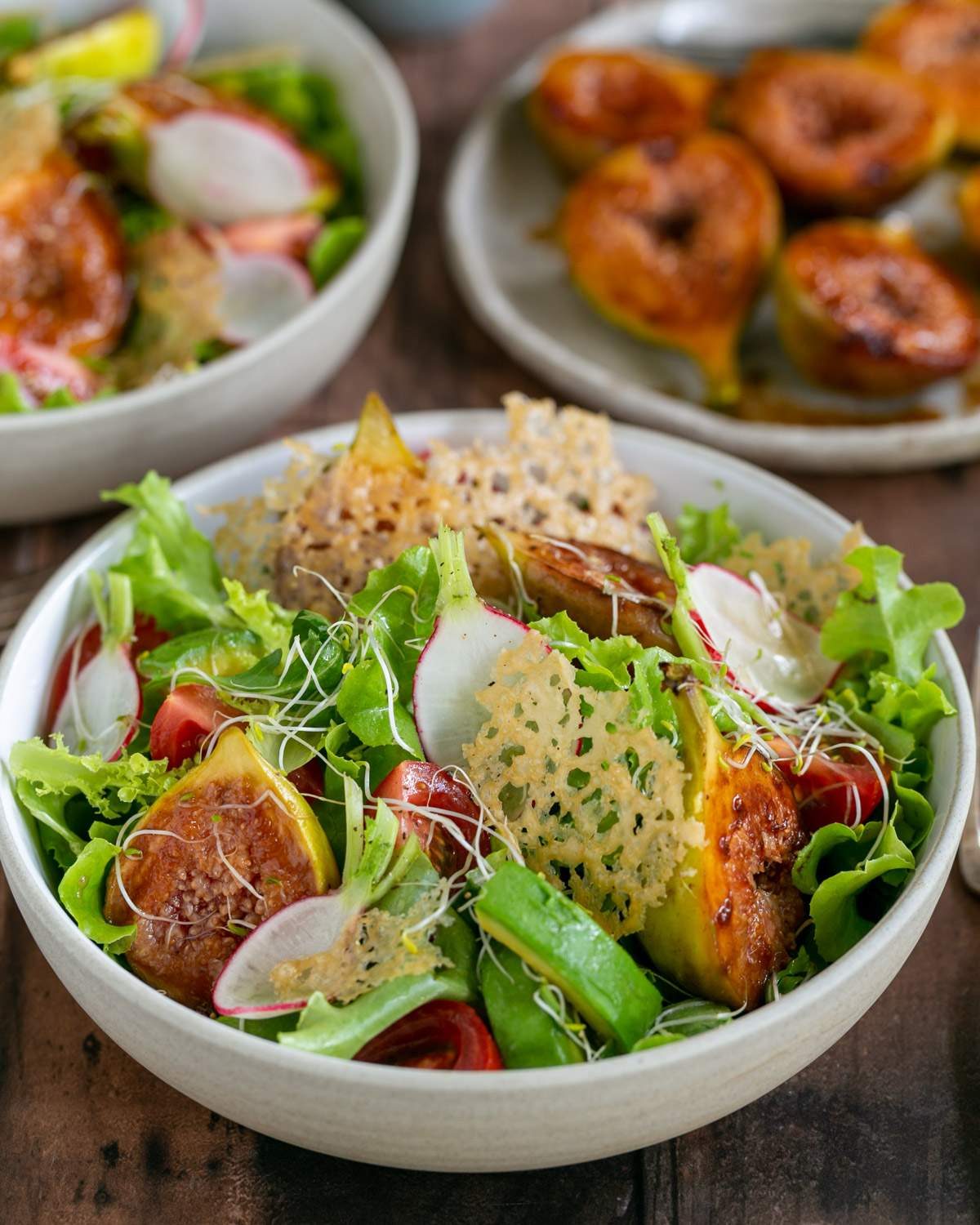 Fig salad with honey roasted figs beautifully presented in a bowl