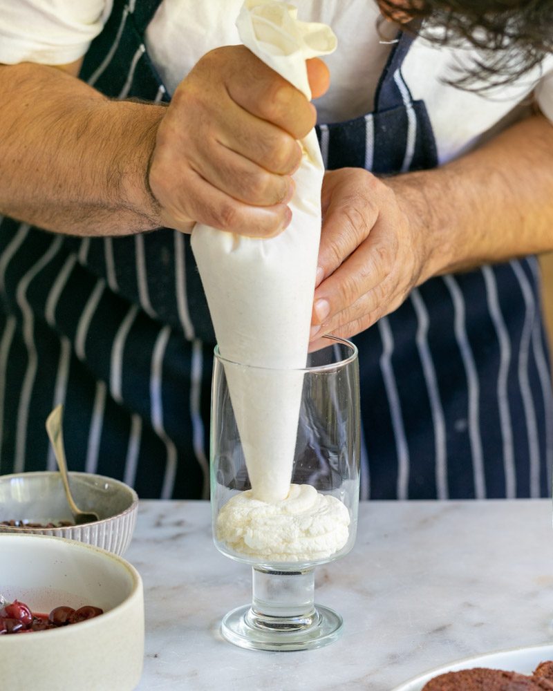 Assembling the black forest cake in a glass