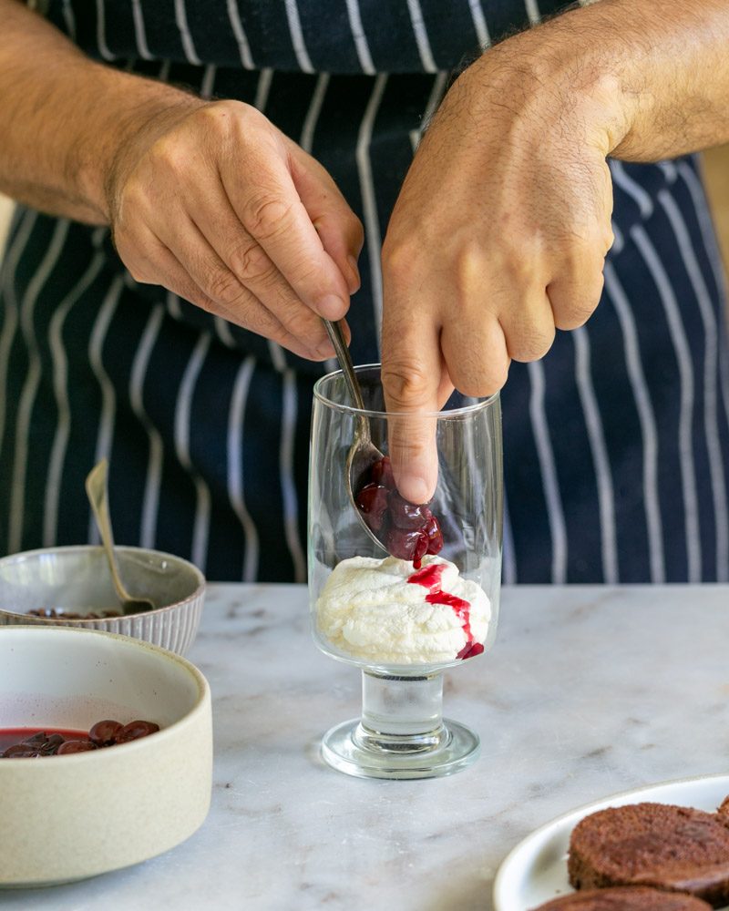Assembling the black forest cake in a glass