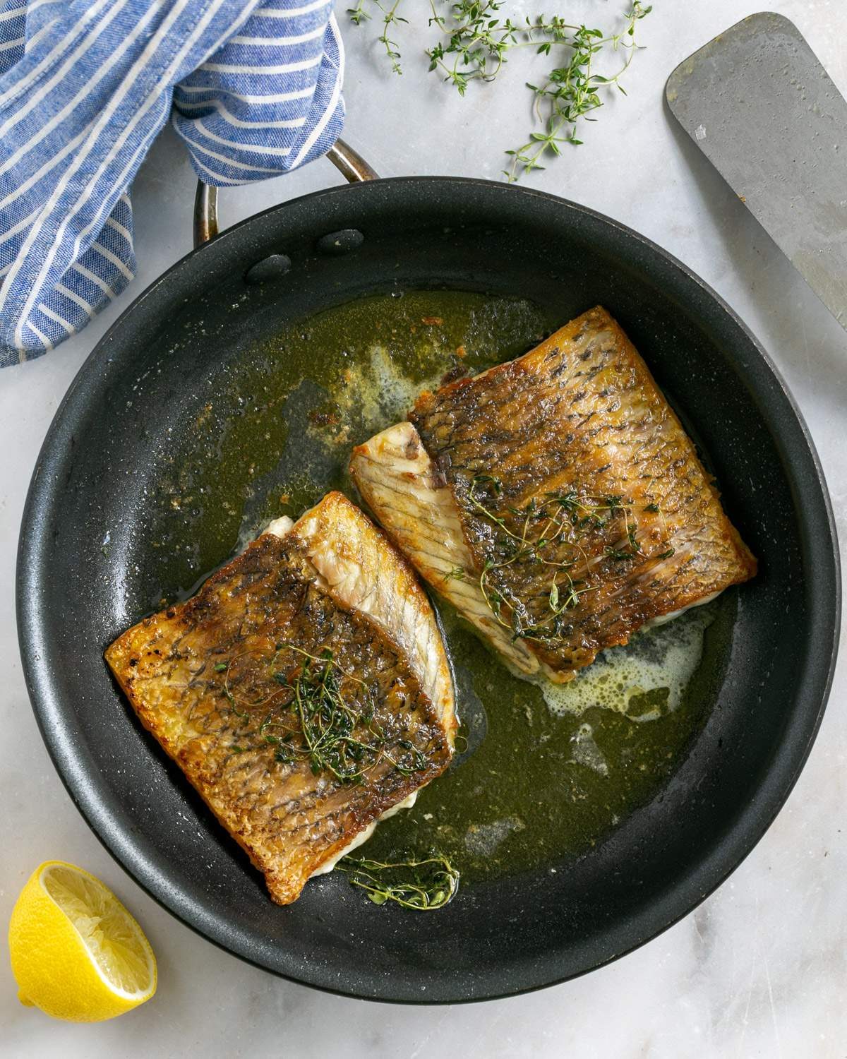 Pan fried Barramundi fish fillets