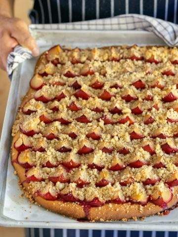 Baked German plum cake out of the oven