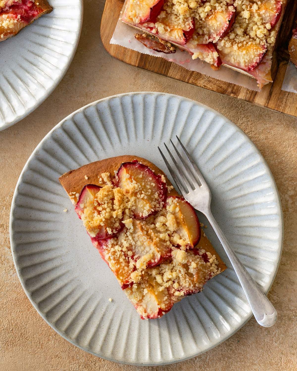 Slice of German plum cake on a plate