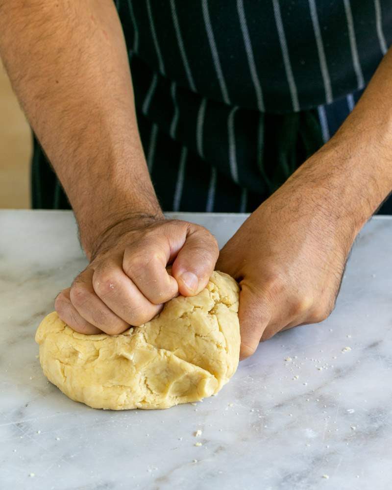 Kneading he dough with hand