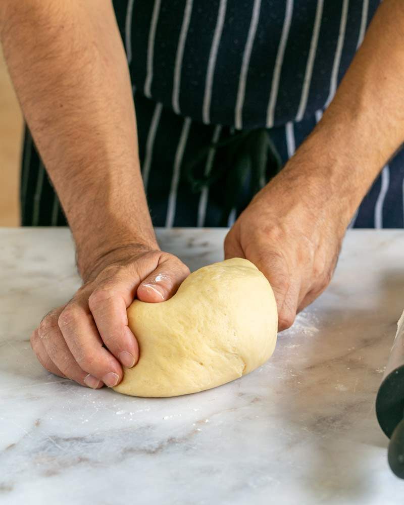 Kneading the dough after rising