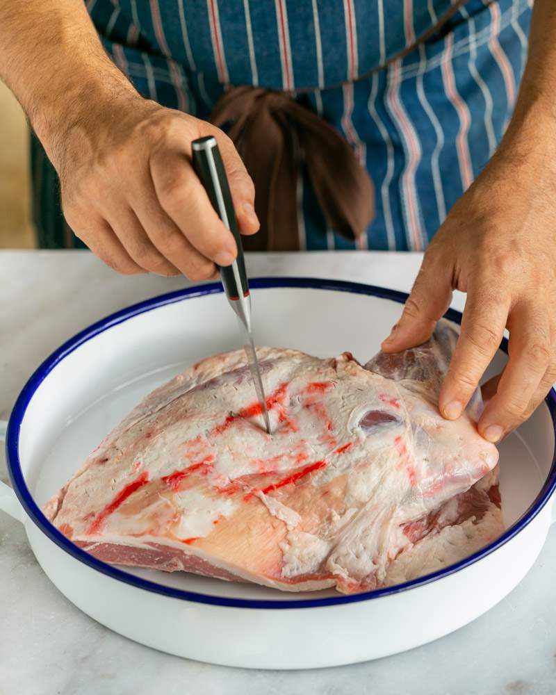 Preparing lamb shoulder to marinate